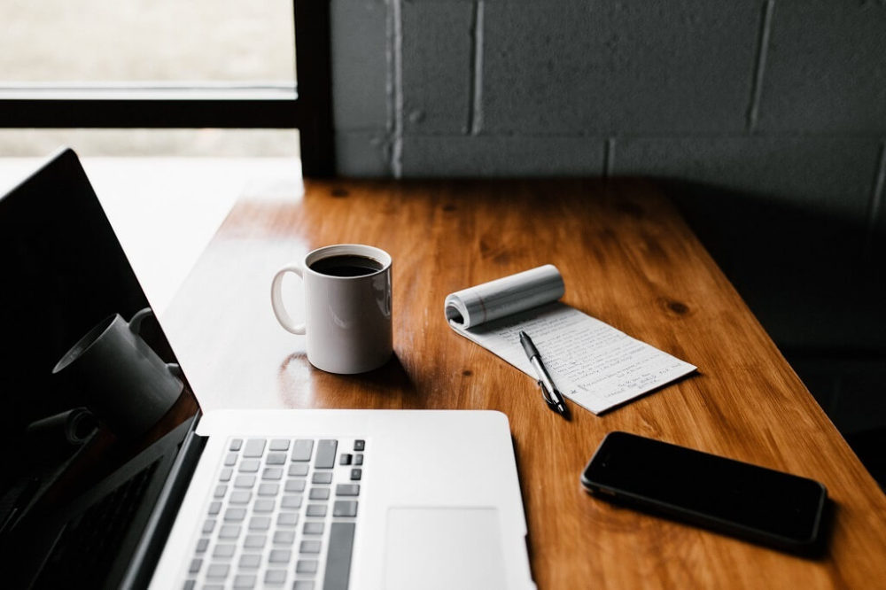 Laptop and cup of coffee